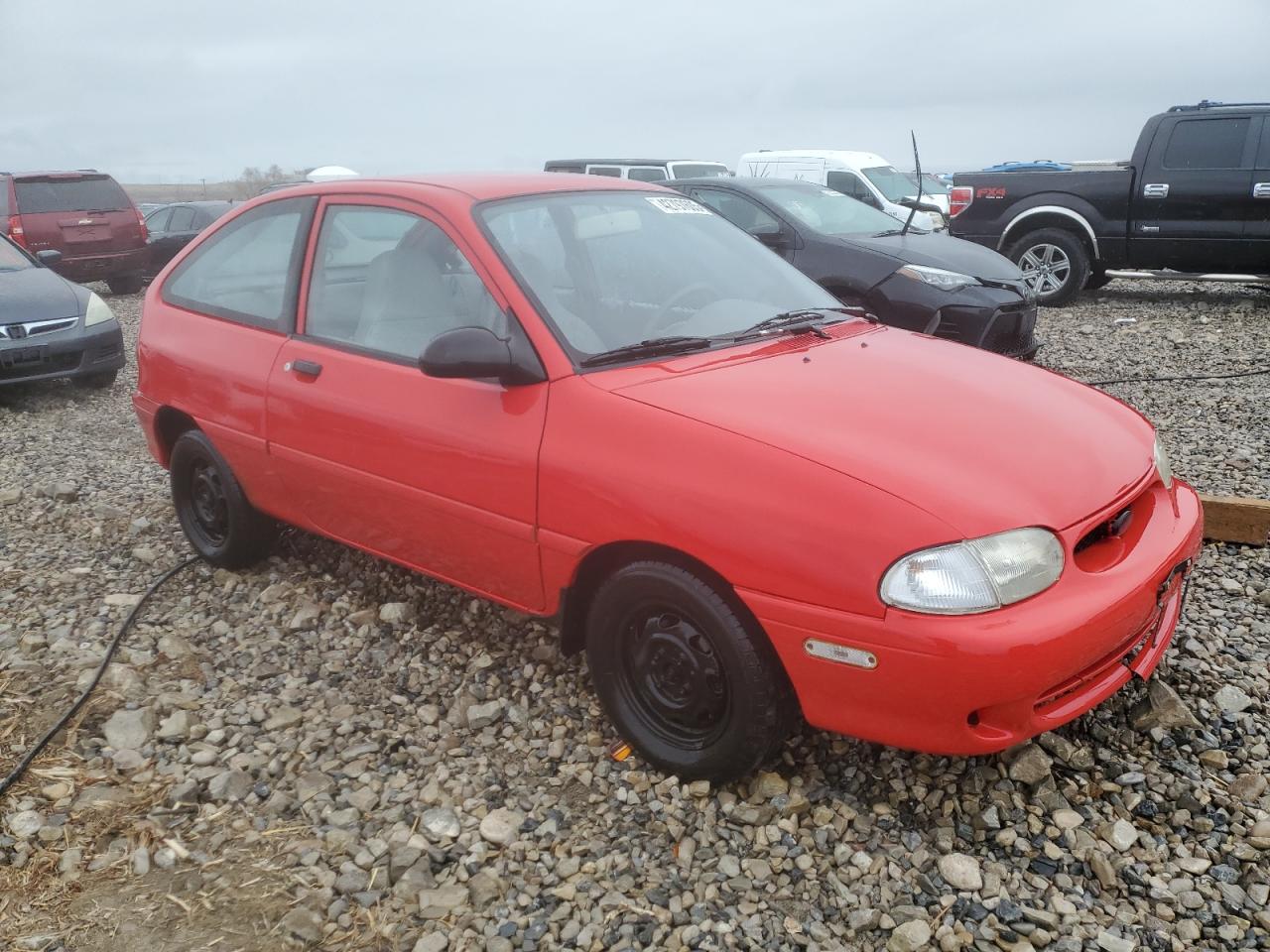 1997 Ford Aspire VIN KNJLT05H8V6219549 Copart auction photo, side damage thumbnail 4