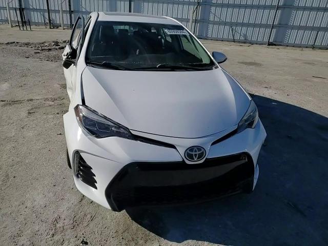 2017 Toyota Corolla VIN 2T1BURHE4HC799381 Copart auction photo, side / front end damage thumbnail 10