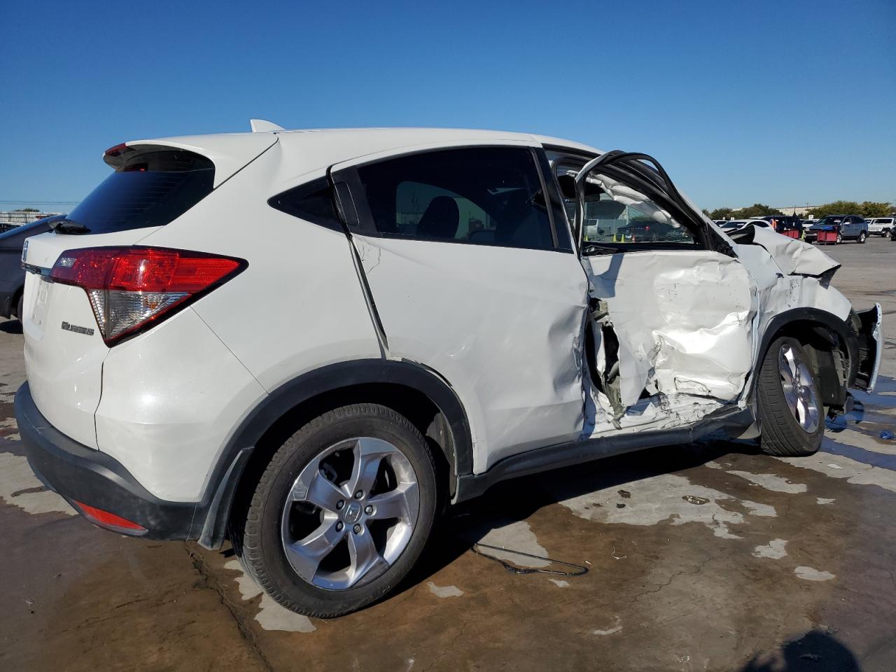 2020 Honda HR-V VIN 3CZRU5H31LM714903 Copart auction photo, side / front end damage thumbnail 3