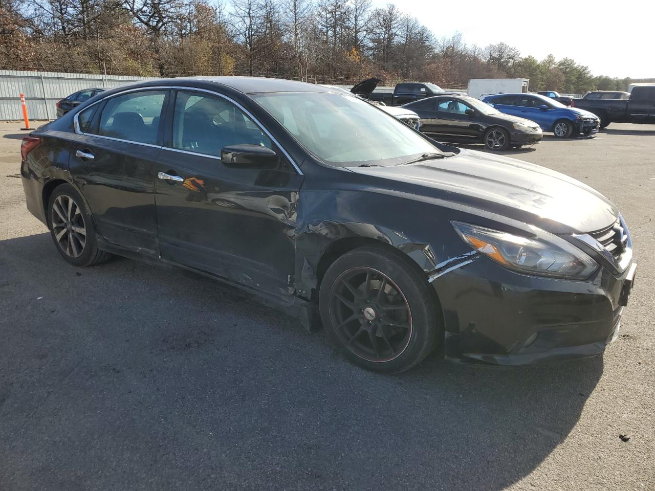 2017 Nissan Altima VIN 1N4AL3AP4HC127293 Copart auction photo, side / front end damage thumbnail 4