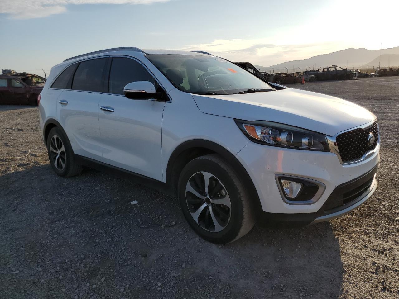 2016 KIA Sorento VIN 5XYPH4A50GG149215 Copart auction photo, biohazard/chemical / side damage thumbnail 4
