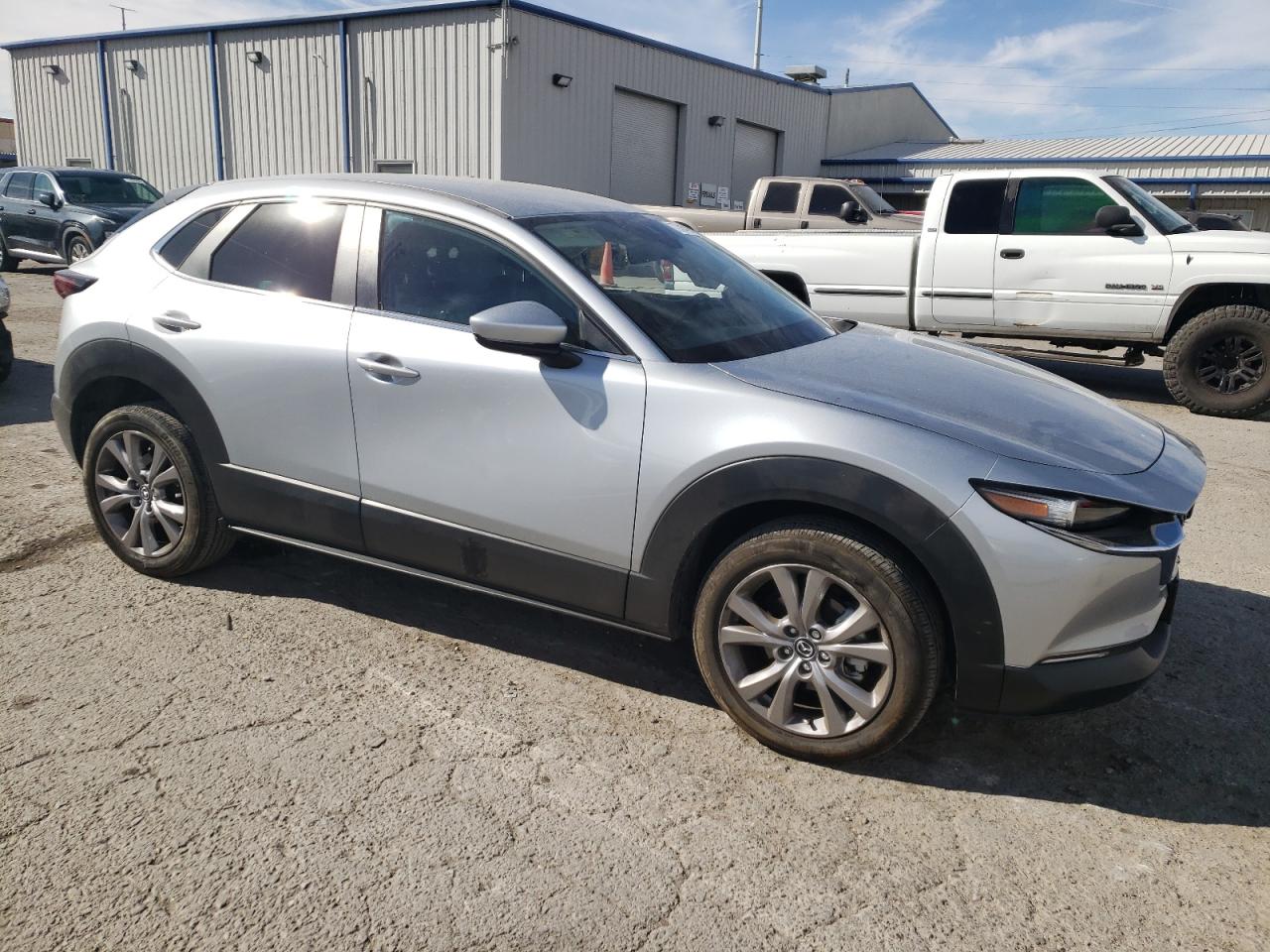 2021 Mazda CX-30 VIN 3MVDMBBL6MM300684 Copart auction photo, side damage thumbnail 4