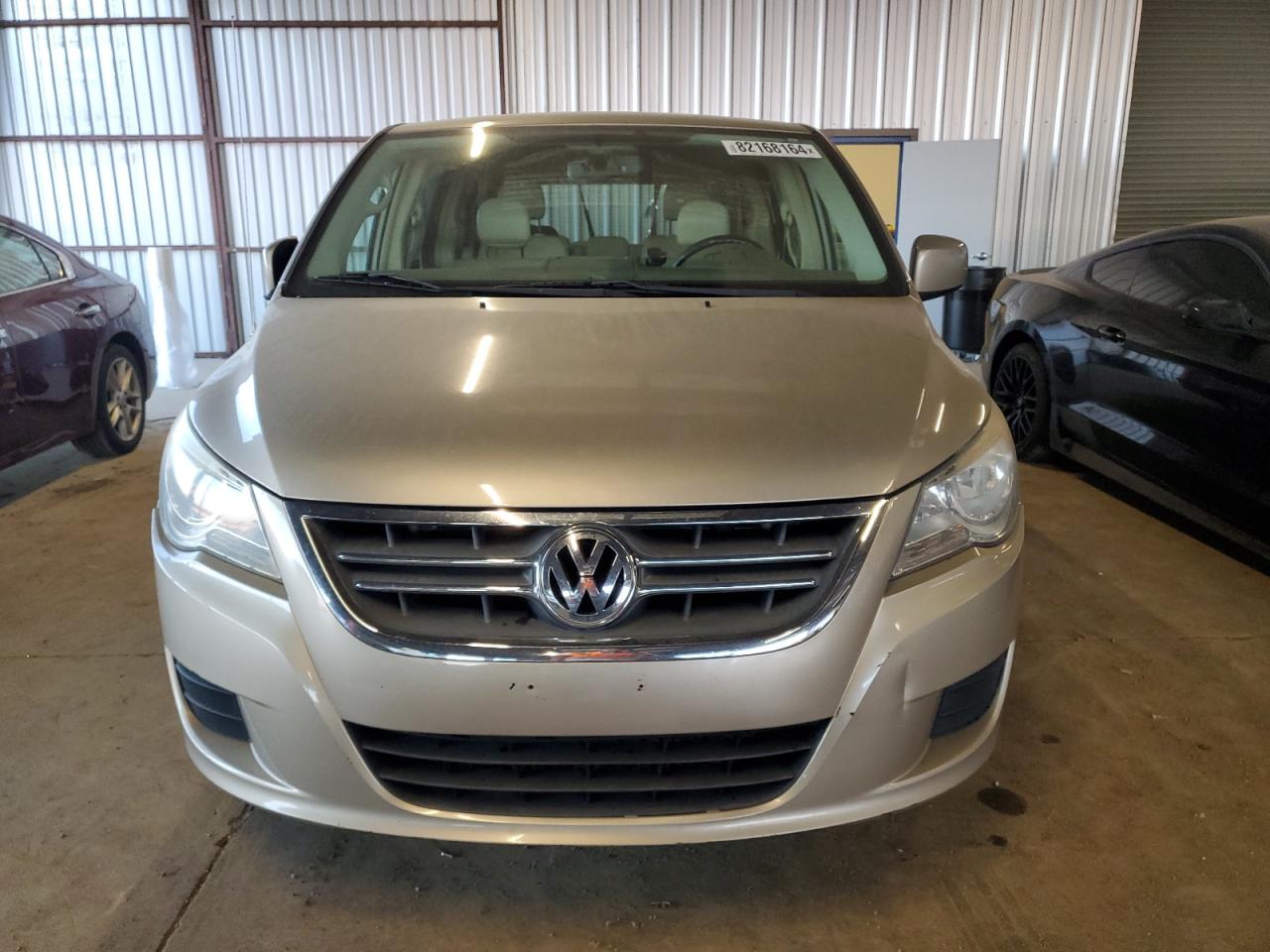 2009 Volkswagen Routan VIN 2V8HW54X39R560706 Copart auction photo, rear end damage thumbnail 5