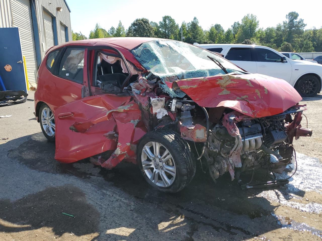 2010 Honda Fit VIN JHMGE8H65AS003391 Copart auction photo, front end / replaced vin damage thumbnail 4
