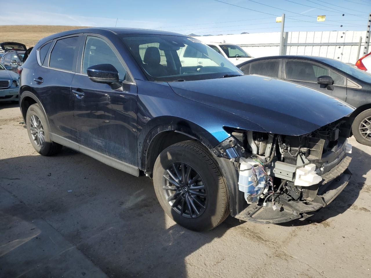 2021 Mazda CX-5 VIN JM3KFBCM6M0317800 Copart auction photo, front end damage thumbnail 4