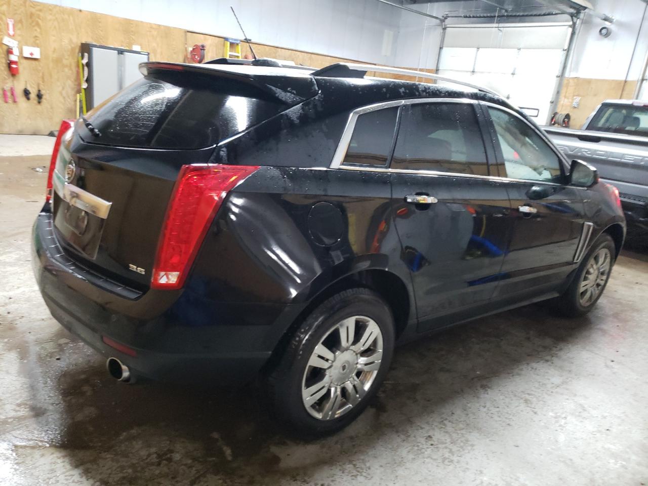 2015 Cadillac SRX VIN 3GYFNEE38FS526304 Copart auction photo, front end / minor dent/scratches damage thumbnail 3