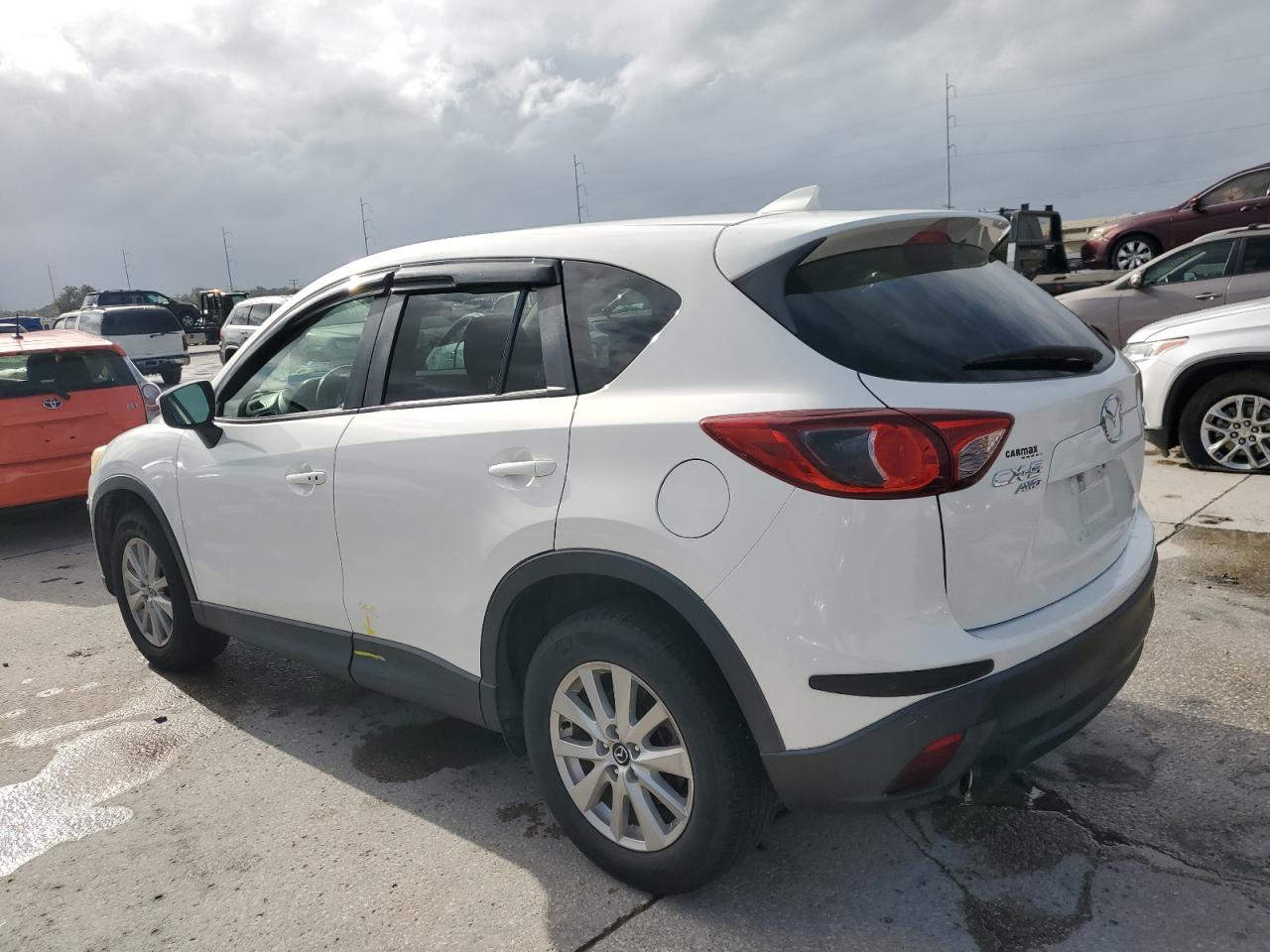 2016 Mazda CX-5 VIN JM3KE4CY8G0640204 Copart auction photo, water/flood damage thumbnail 2