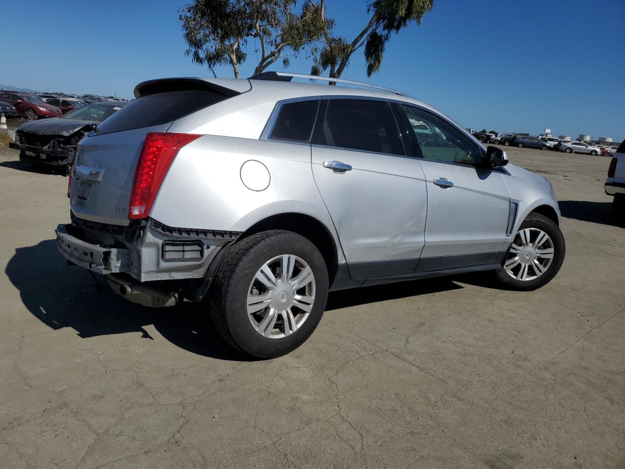 2016 Cadillac SRX VIN 3GYFNBE35GS533002 Copart auction photo, all over damage thumbnail 3