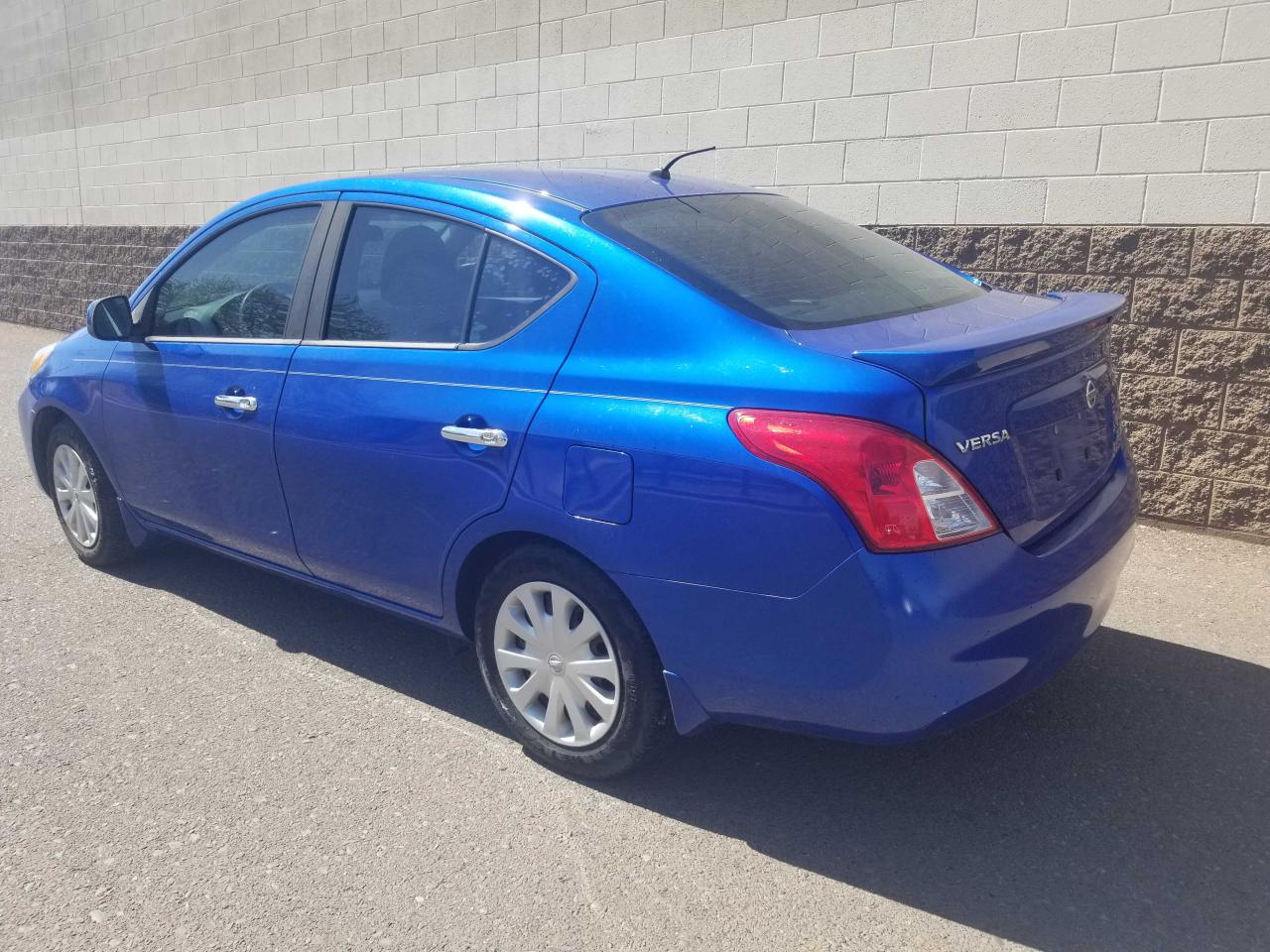 2014 Nissan Versa VIN 3N1CN7AP1EL808891 Copart auction photo, normal wear / minor dent/scratches damage thumbnail 3