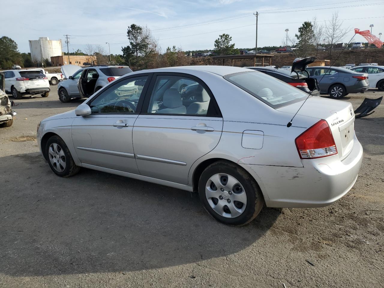 2009 KIA Spectra VIN KNAFE221095629560 Copart auction photo, side damage thumbnail 2
