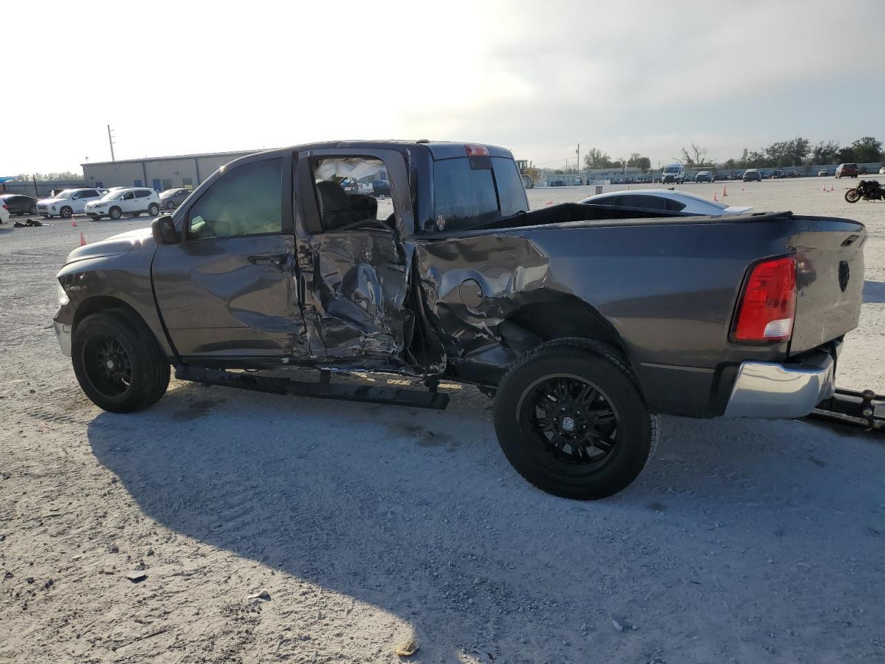 2019 RAM 1500 VIN 1C6RR6TTXKS561732 Copart auction photo, side / rear end damage thumbnail 2