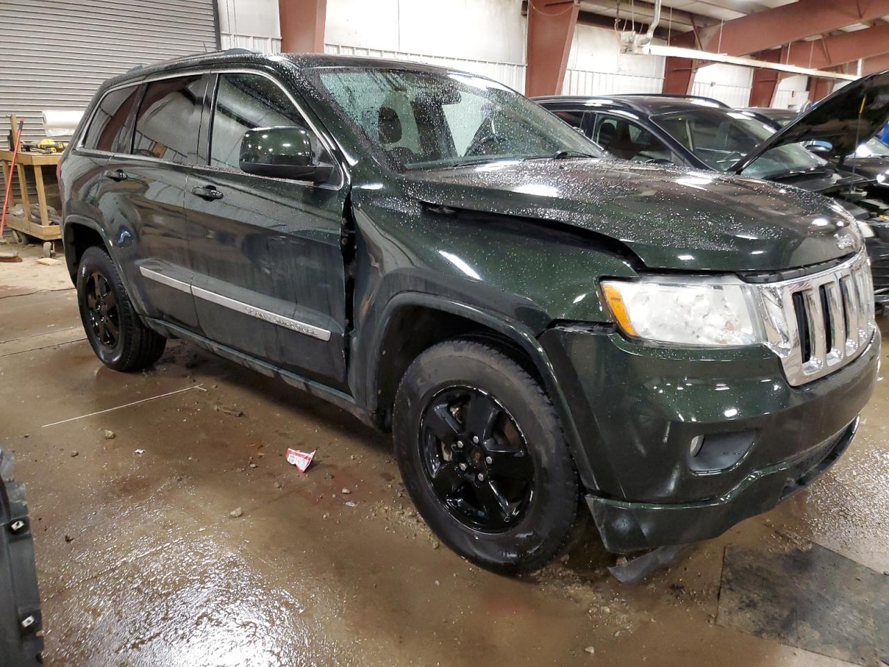 2011 Jeep Grand Cherokee VIN 1J4RR4GG6BC534719 Copart auction photo, front end / side damage thumbnail 4