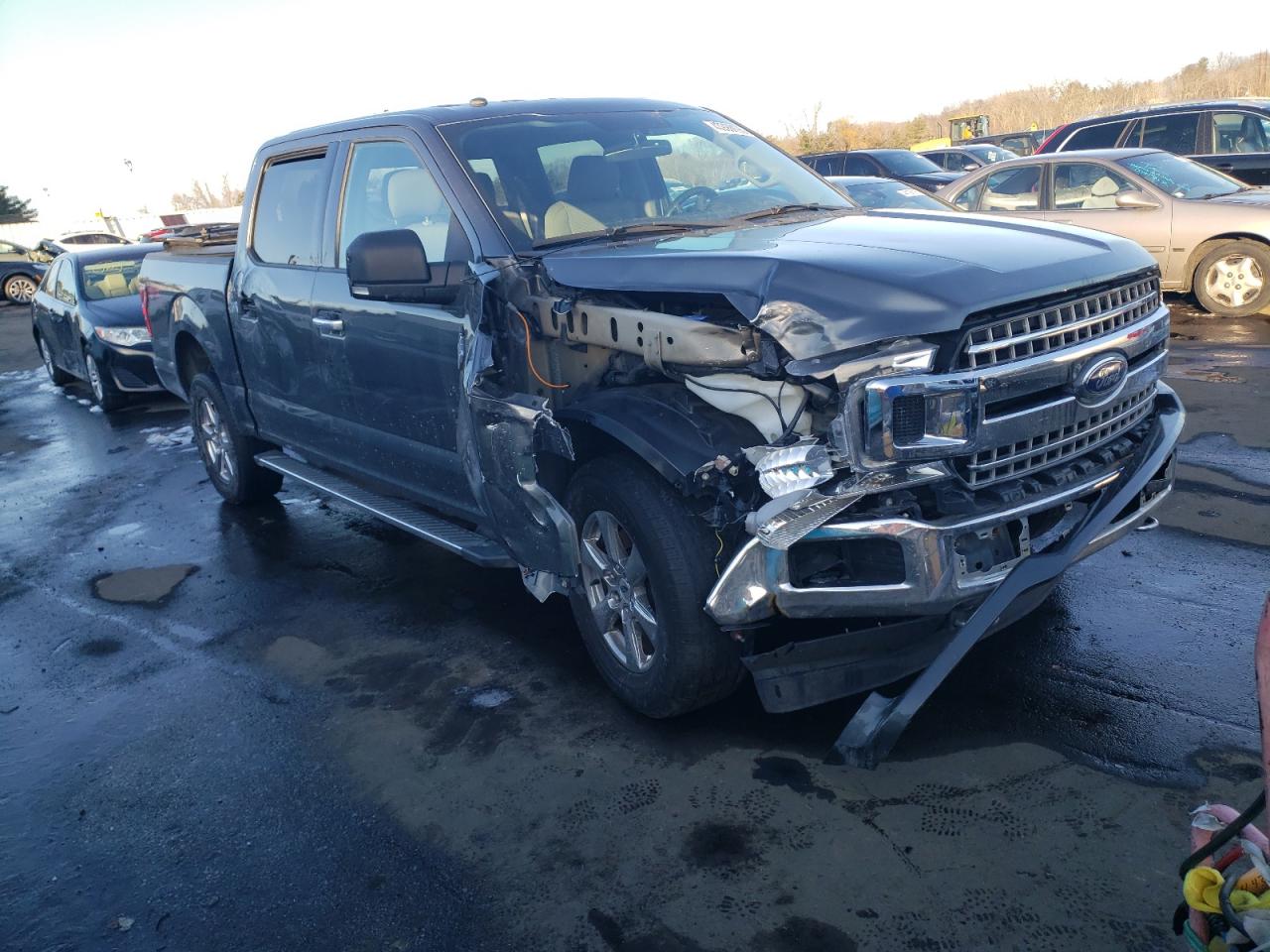 2018 Ford F-150 VIN 1FTEW1E5XJFC07265 Copart auction photo, front end / side damage thumbnail 4