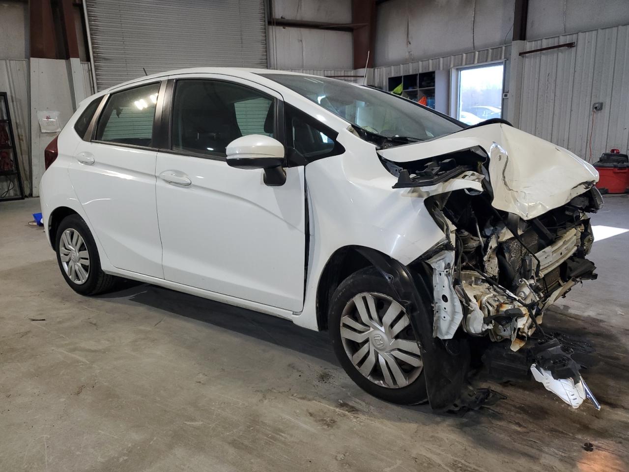 2015 Honda Fit VIN 3HGGK5H55FM759434 Copart auction photo, front end damage thumbnail 4