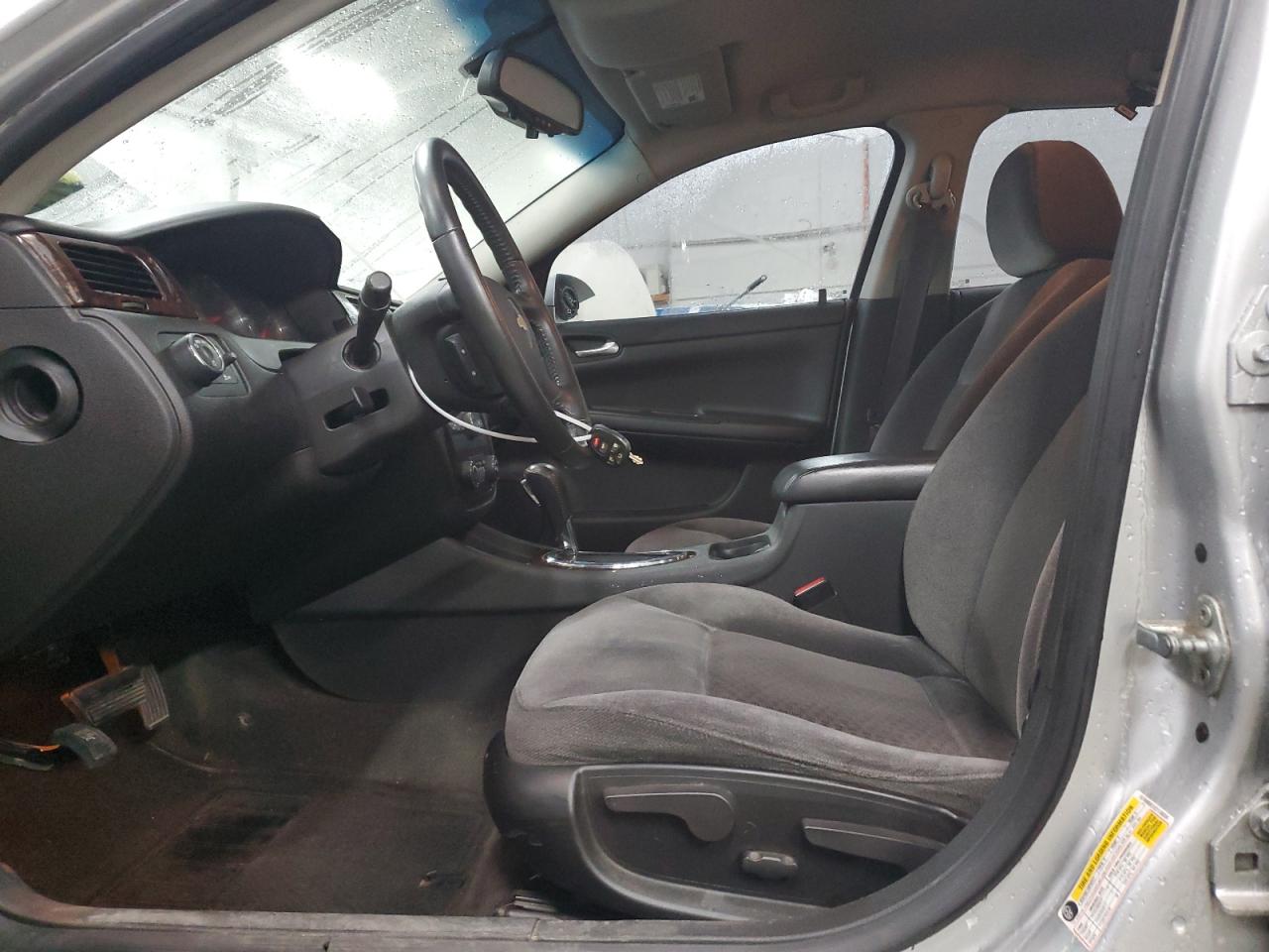 2012 Chevrolet Impala VIN 2G1WB5E31C1130200 Copart auction photo, front end / side damage thumbnail 7