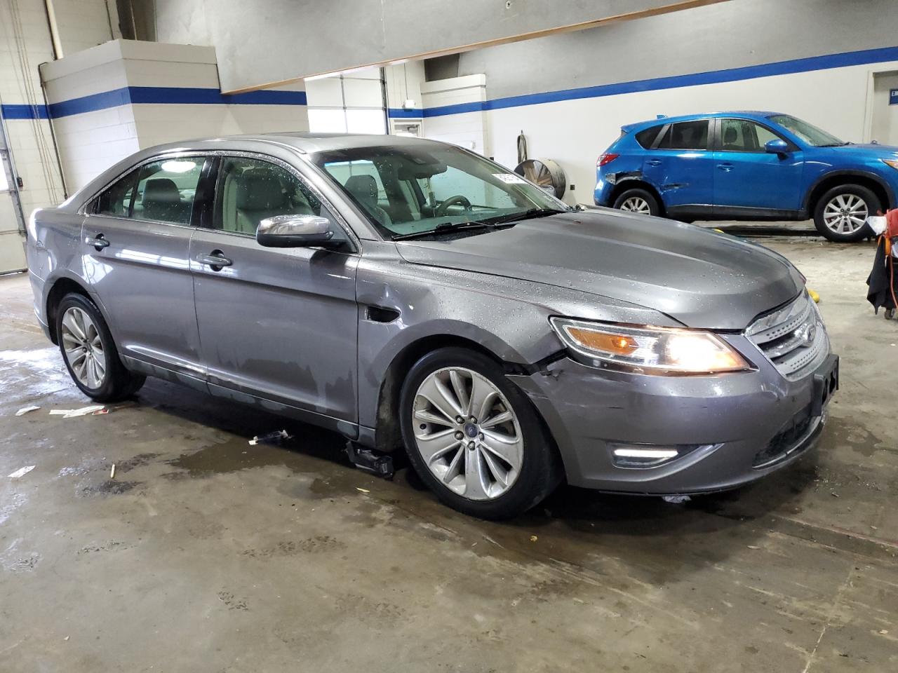 2011 Ford Taurus VIN 1FAHP2JW4BG168981 Copart auction photo, front end damage thumbnail 4