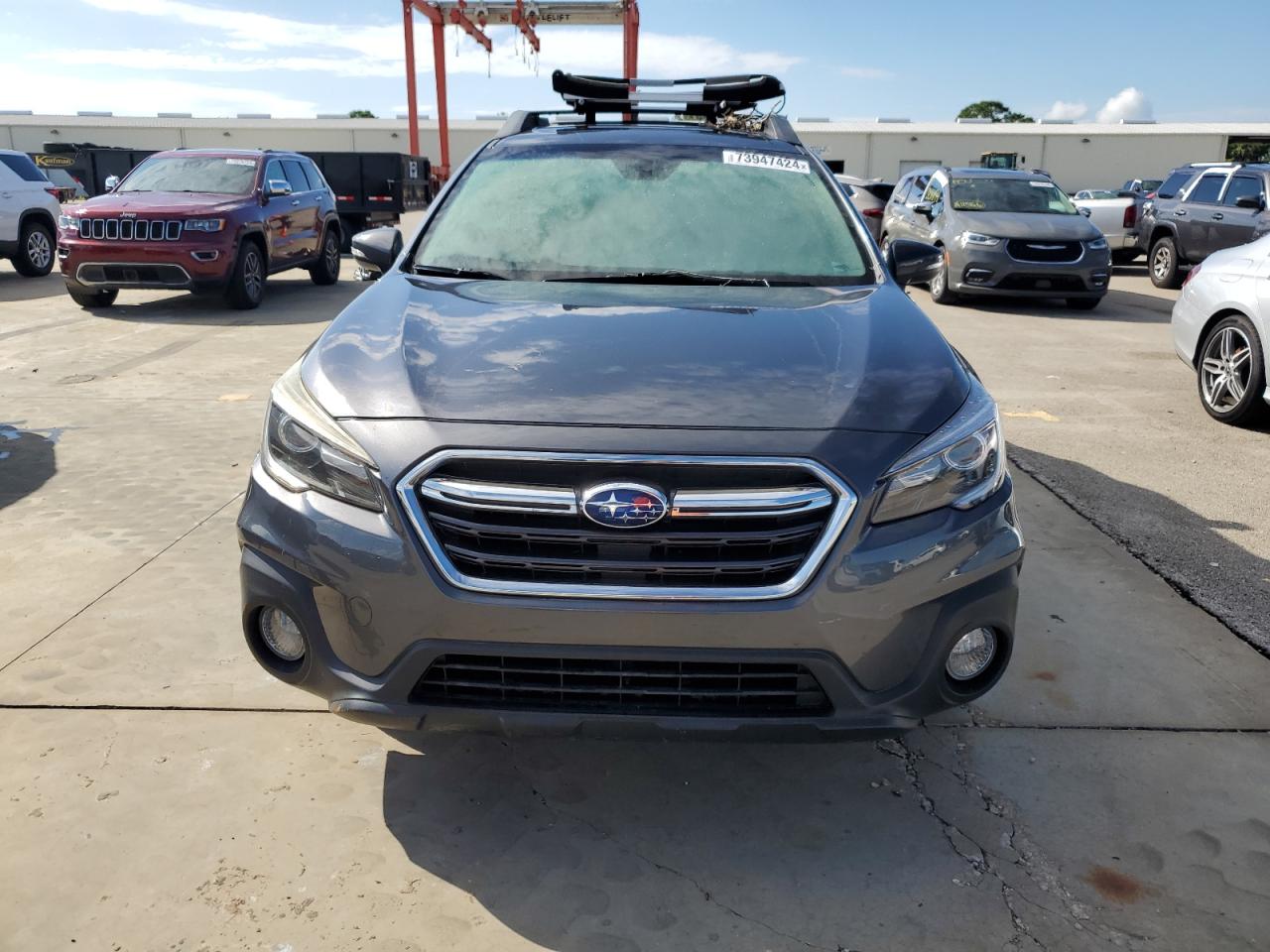 2018 Subaru Outback VIN 4S4BSANC6J3237292 Copart auction photo, water/flood damage thumbnail 5