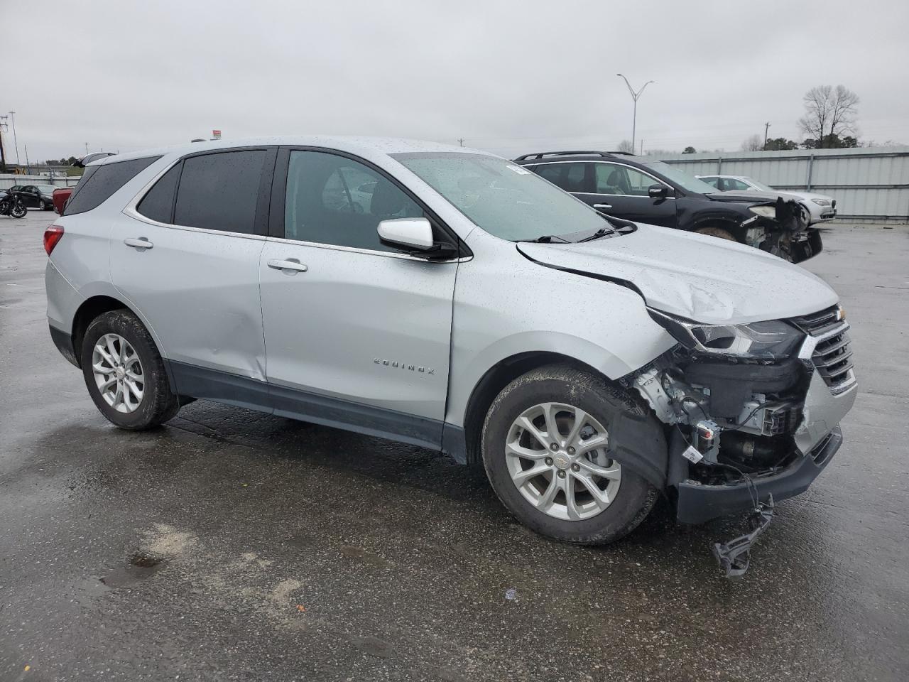2021 Chevrolet Equinox VIN 3GNAXJEV6ML393044 Copart auction photo, front end / side damage thumbnail 4