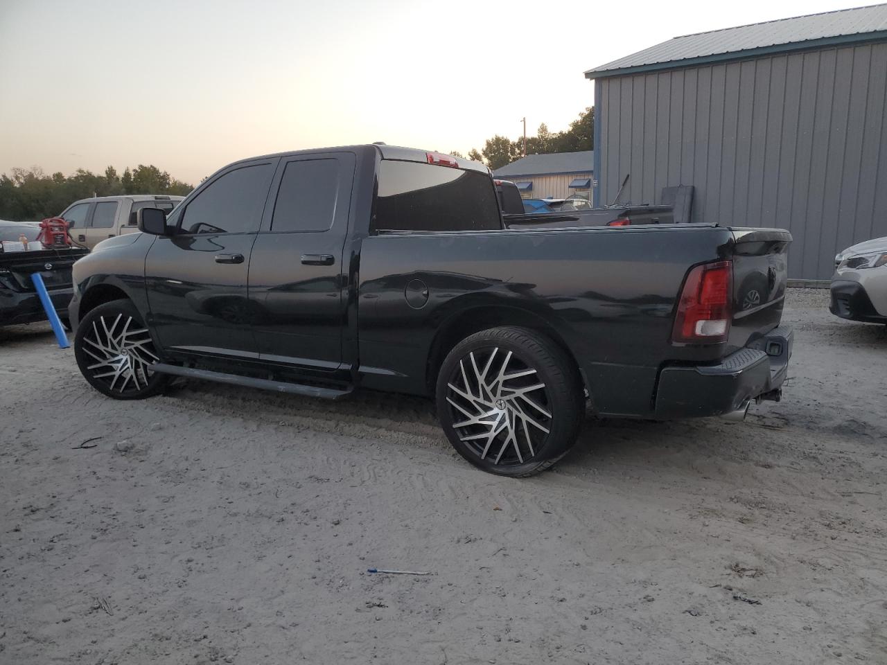 2015 RAM 1500 VIN 1C6RR6FT9FS506125 Copart auction photo, rear end / side damage thumbnail 2