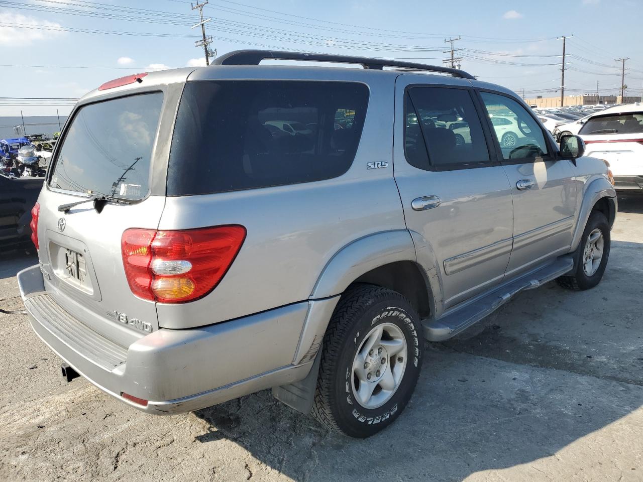 2002 Toyota Sequoia VIN 5TDBT44AX2S097251 Copart auction photo, side damage thumbnail 3