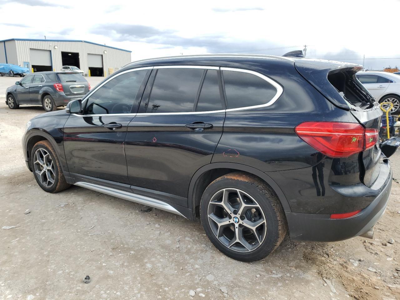 2018 BMW X1 VIN WBXHT3C32J5L28030 Copart auction photo, rear end / minor dent/scratches damage thumbnail 2