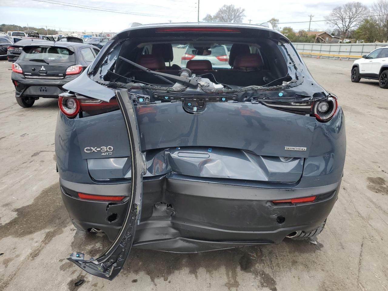 2023 Mazda CX-30 VIN 3MVDMBCM2PM558342 Copart auction photo, all over damage thumbnail 6