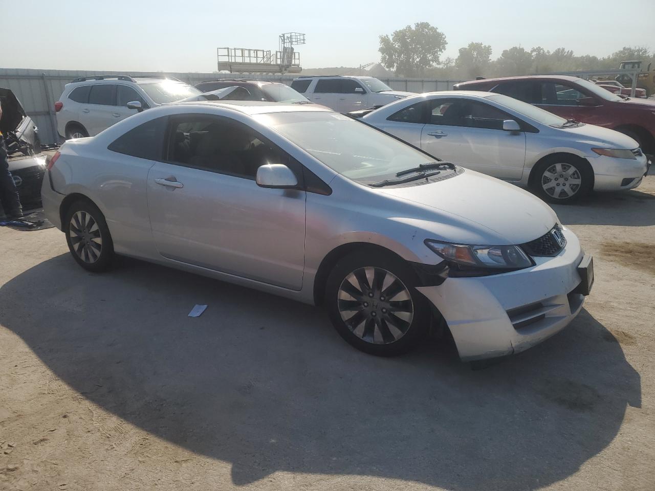 2009 Honda Civic VIN 2HGFG128X9H520585 Copart auction photo, side / front end damage thumbnail 4