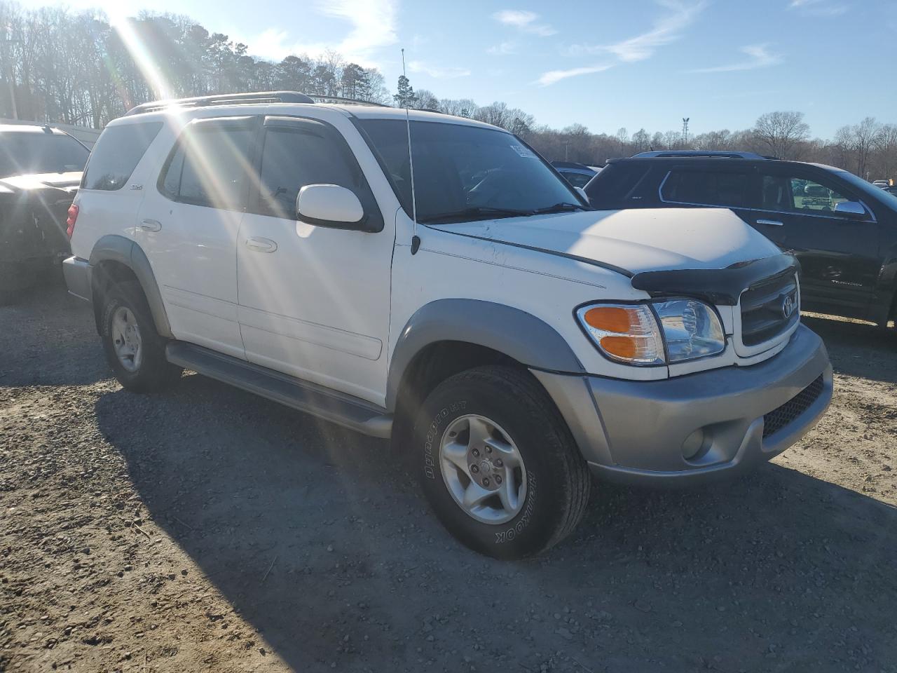 2001 Toyota Sequoia VIN 5TDZT34A91S042989 Copart auction photo, front end / minor dent/scratches damage thumbnail 4
