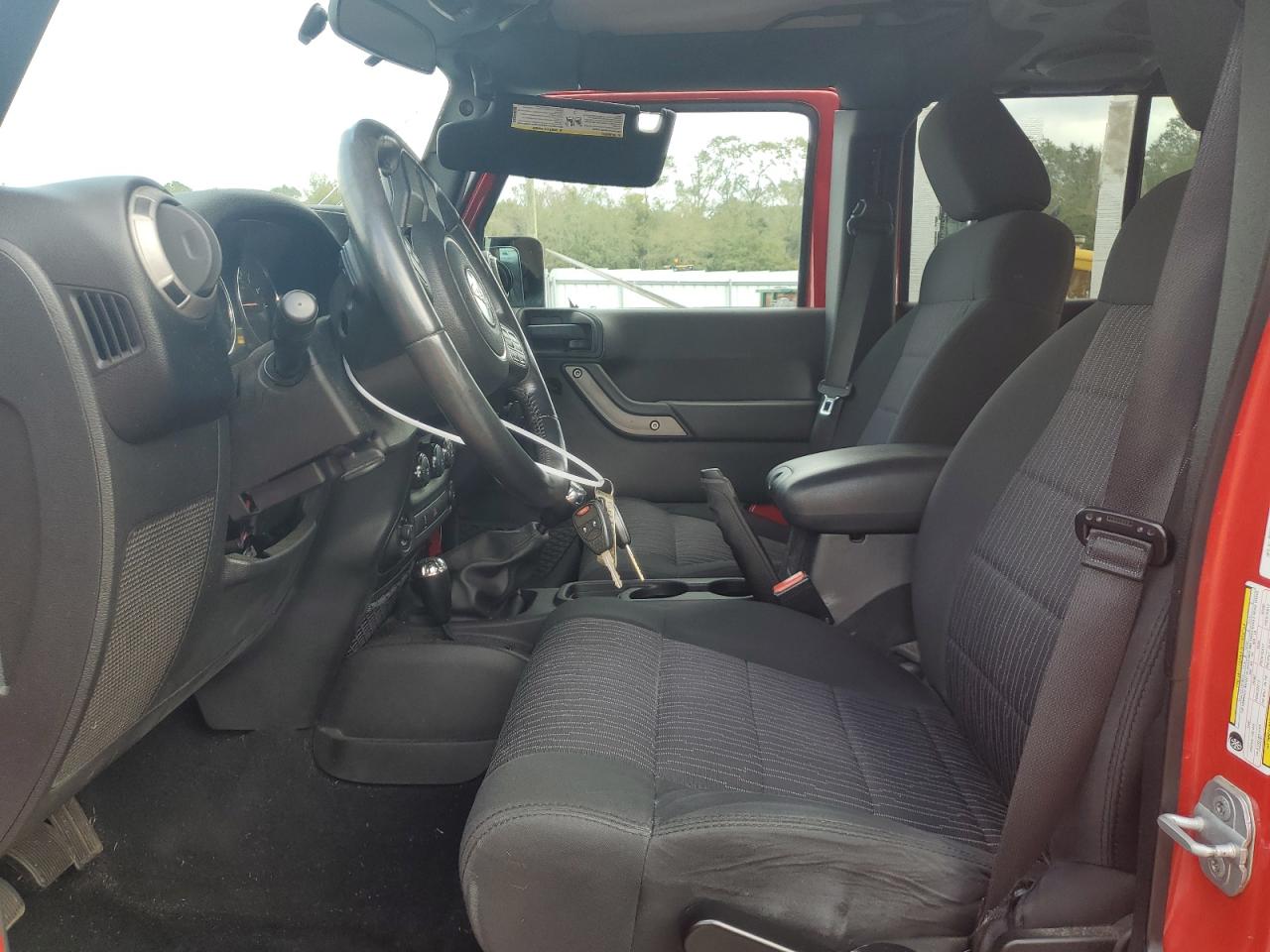 2012 Jeep Wrangler VIN 1C4BJWDG9CL231448 Copart auction photo, side / front end damage thumbnail 7