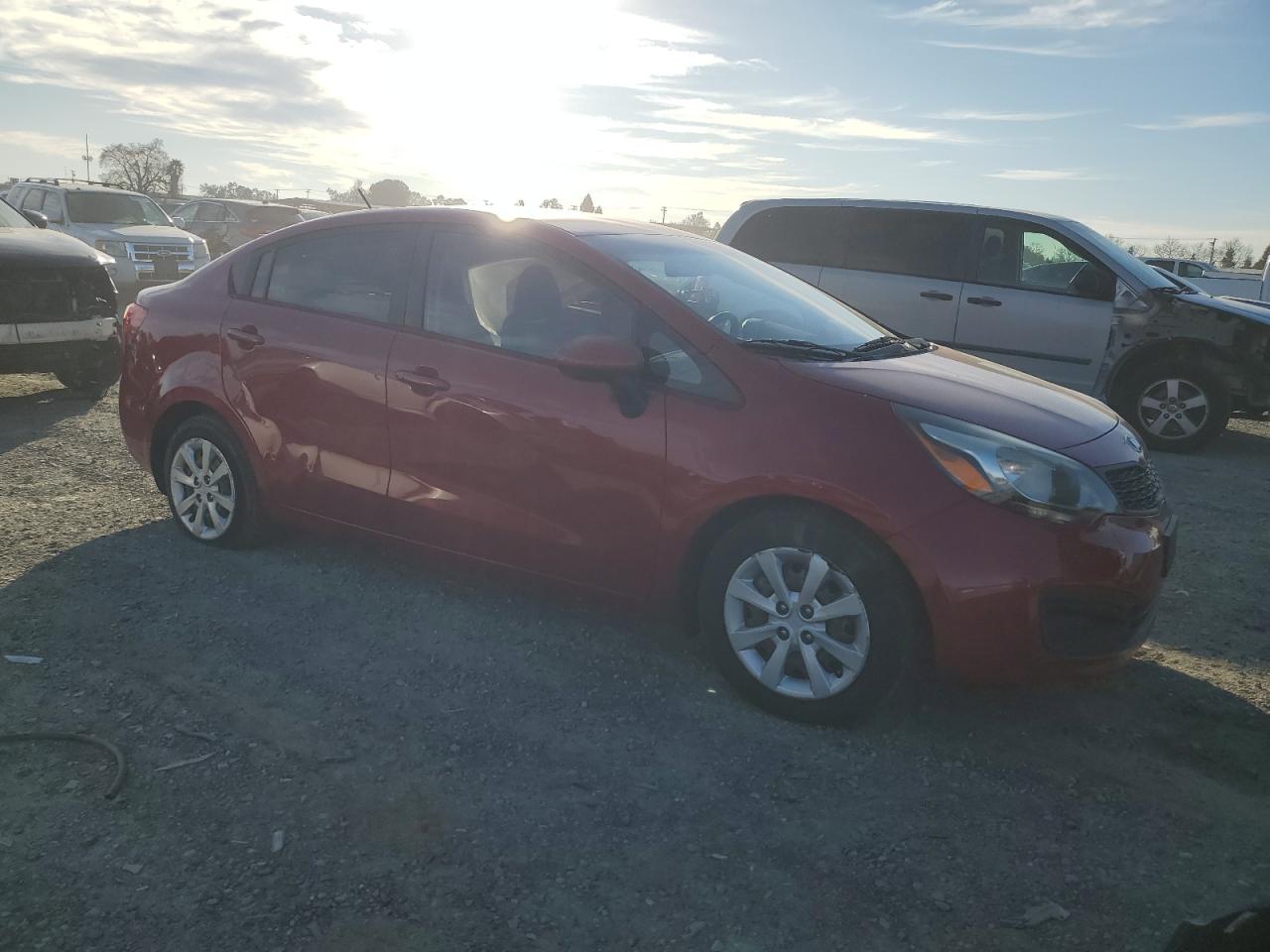 2015 KIA Rio VIN KNADM4A30F6442978 Copart auction photo, side / rear end damage thumbnail 4