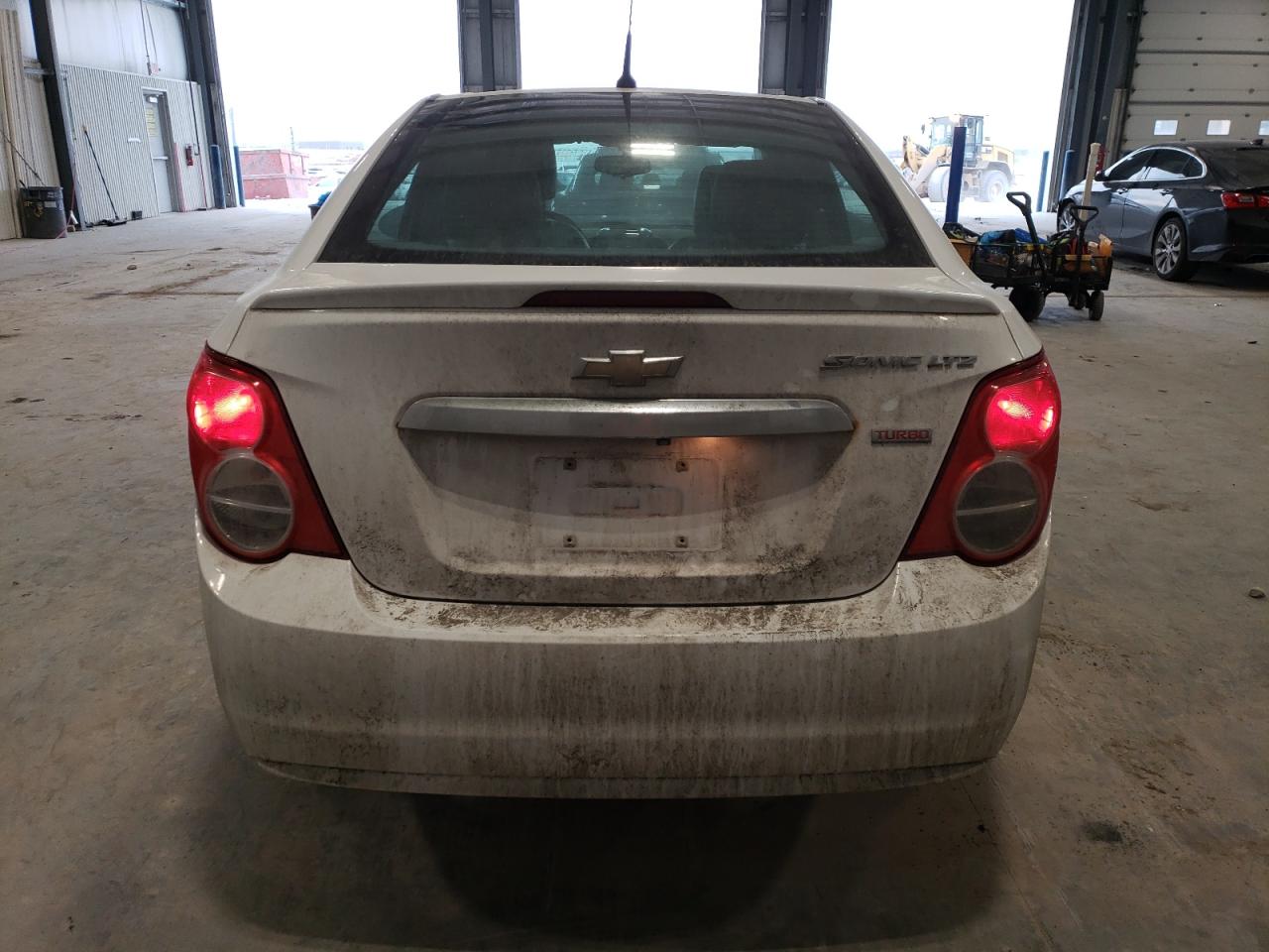2014 Chevrolet Sonic VIN 1G1JE5SB8E4217967 Copart auction photo, vandalism / front end damage thumbnail 6