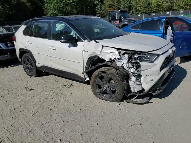 2021 Toyota RAV 4 VIN 4T3E6RFV2MU054428 Copart auction photo, front end / side damage thumbnail 12