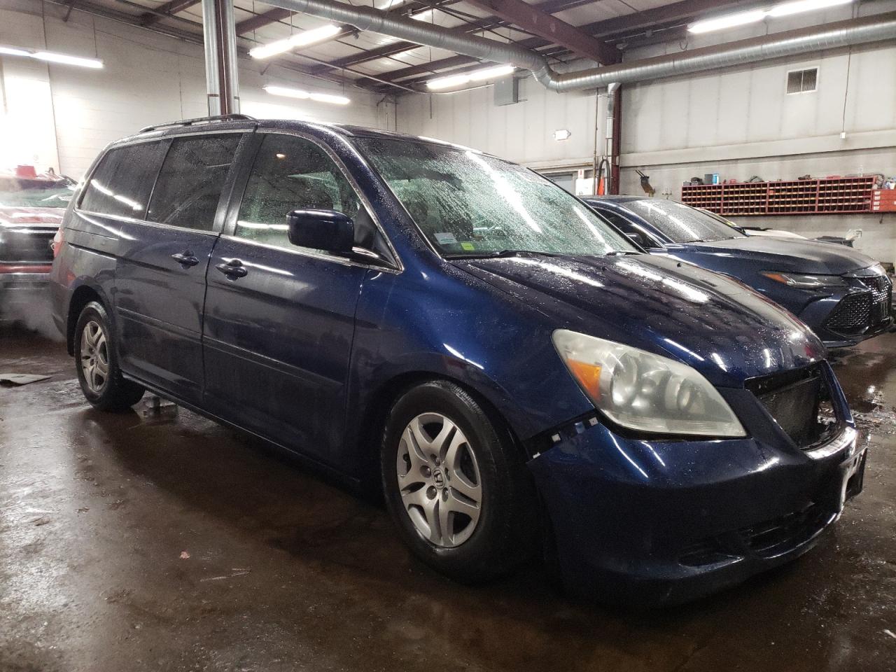 2005 Honda Odyssey VIN 5FNRL384X5B019591 Copart auction photo, front end / side damage thumbnail 4