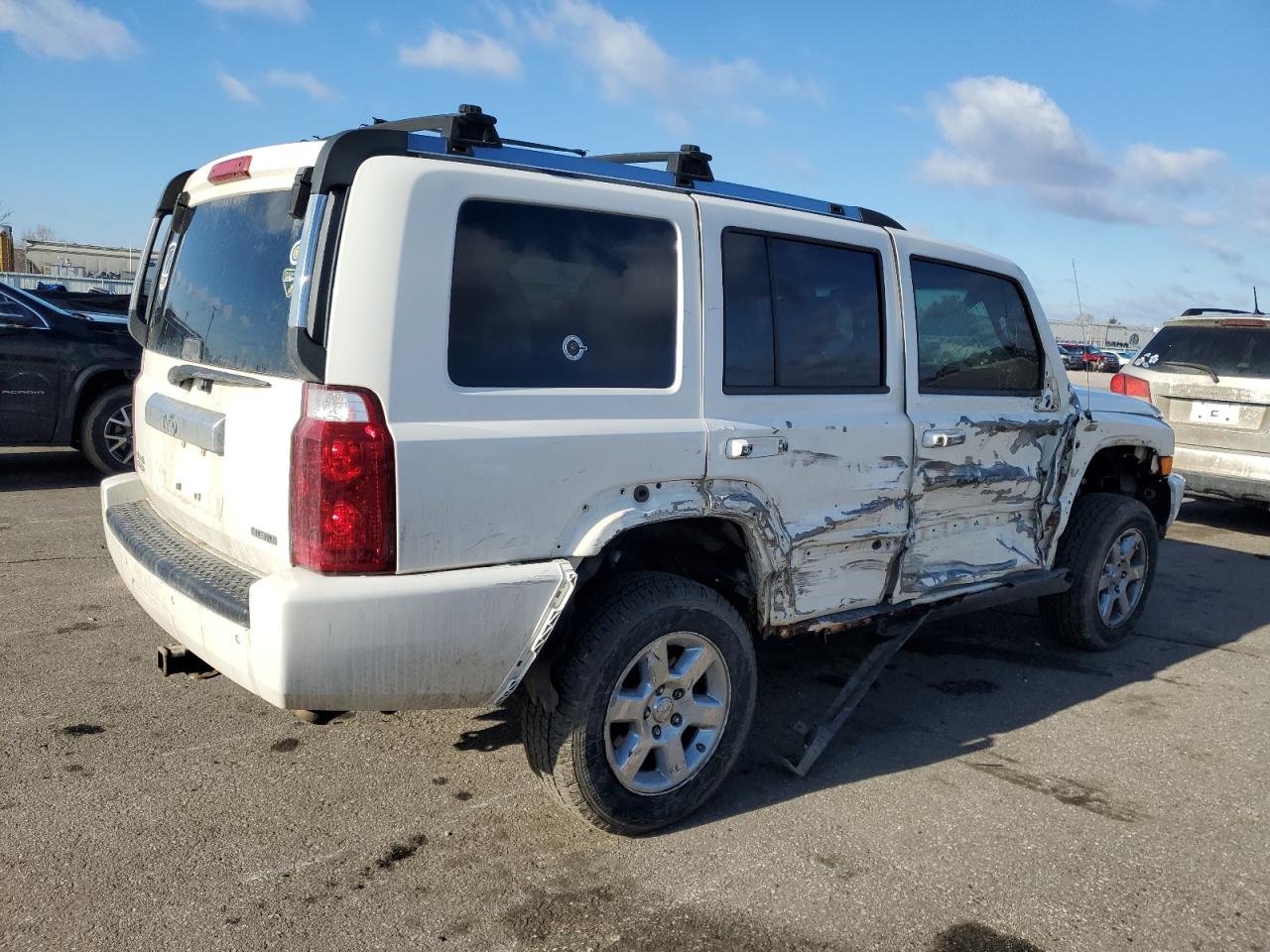 2007 Jeep Commander VIN 1J8HG58257C550300 Copart auction photo, side / front end damage thumbnail 3