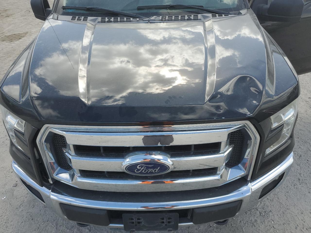 2015 Ford F-150 VIN 1FTEW1E8XFFB63950 Copart auction photo, side damage thumbnail 11