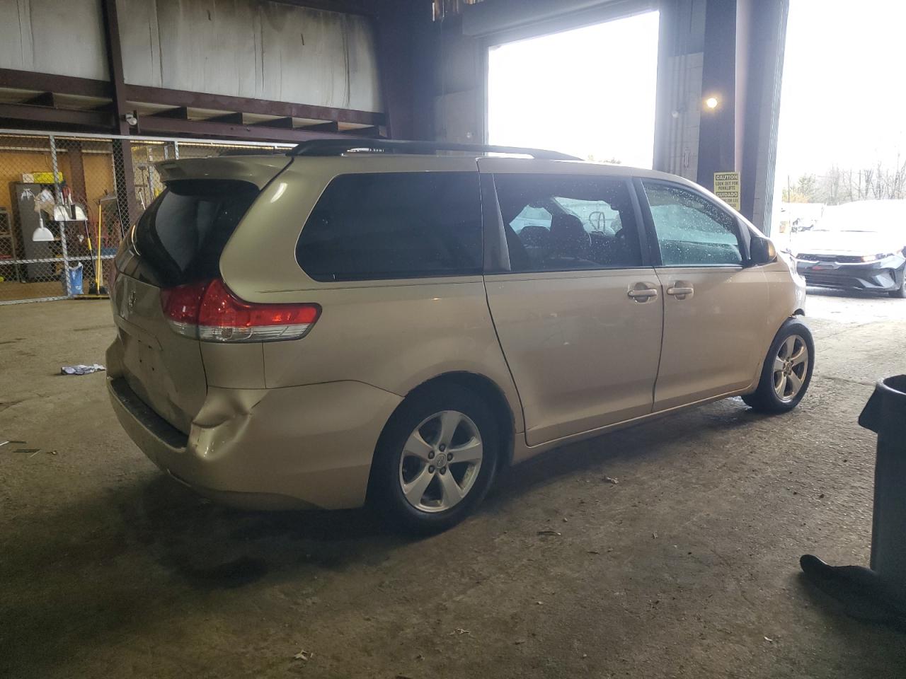 2011 Toyota Sienna VIN 5TDKK3DC7BS065601 Copart auction photo, front end / rear end damage thumbnail 3