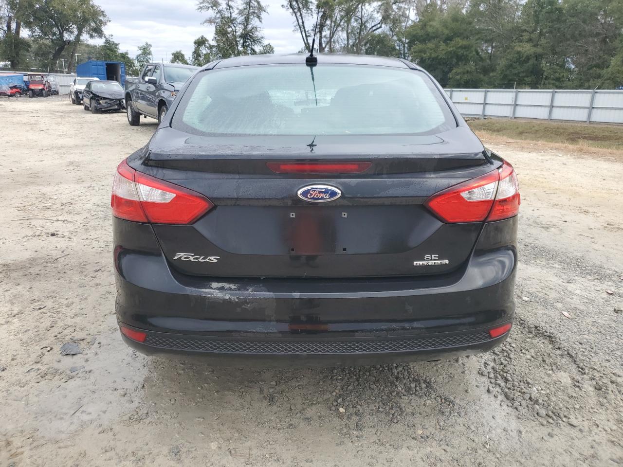 2014 Ford Focus VIN 1FADP3F23EL301140 Copart auction photo, all over damage thumbnail 6