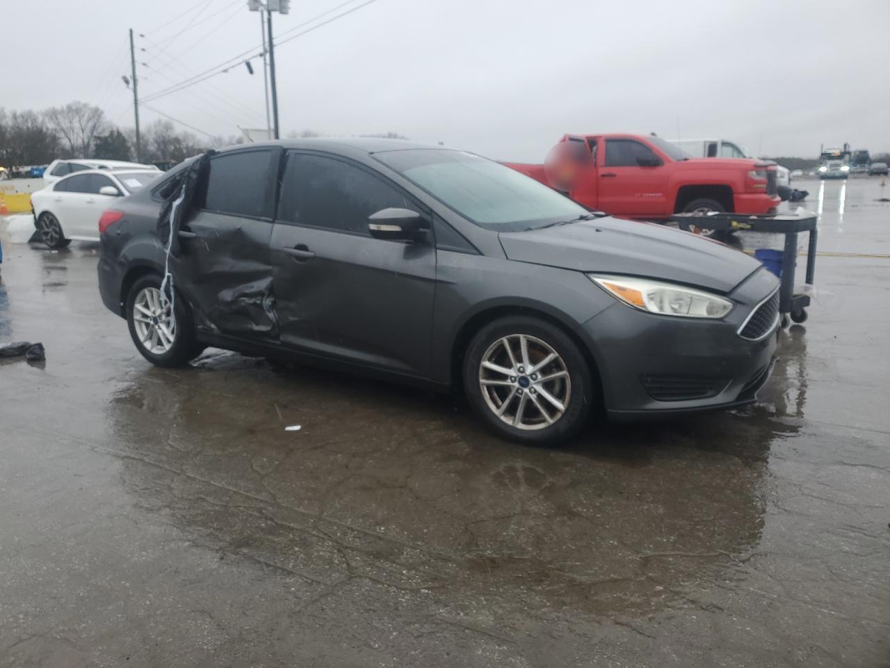 2016 Ford Focus VIN 1FADP3F2XGL308055 Copart auction photo, side damage thumbnail 4