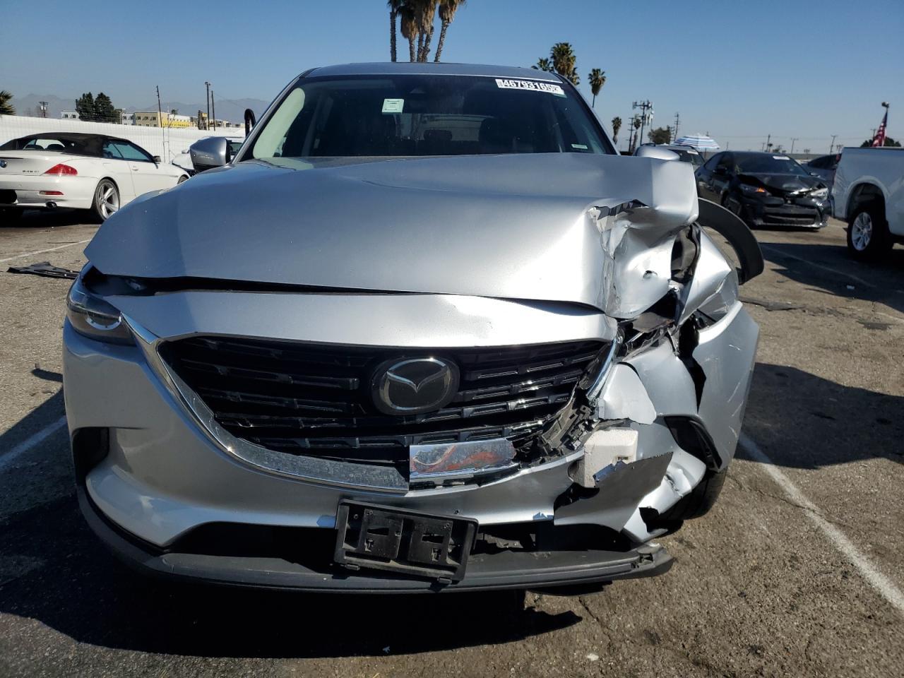 2023 Mazda CX-9 VIN JM3TCBAYXP0659516 Copart auction photo, front end / side damage thumbnail 5
