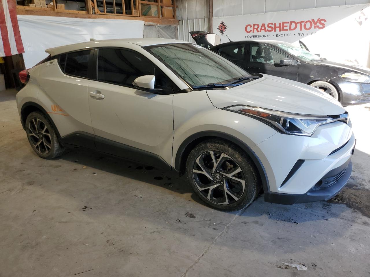 2018 Toyota C-HR VIN NMTKHMBX8JR012607 Copart auction photo, water/flood damage thumbnail 4