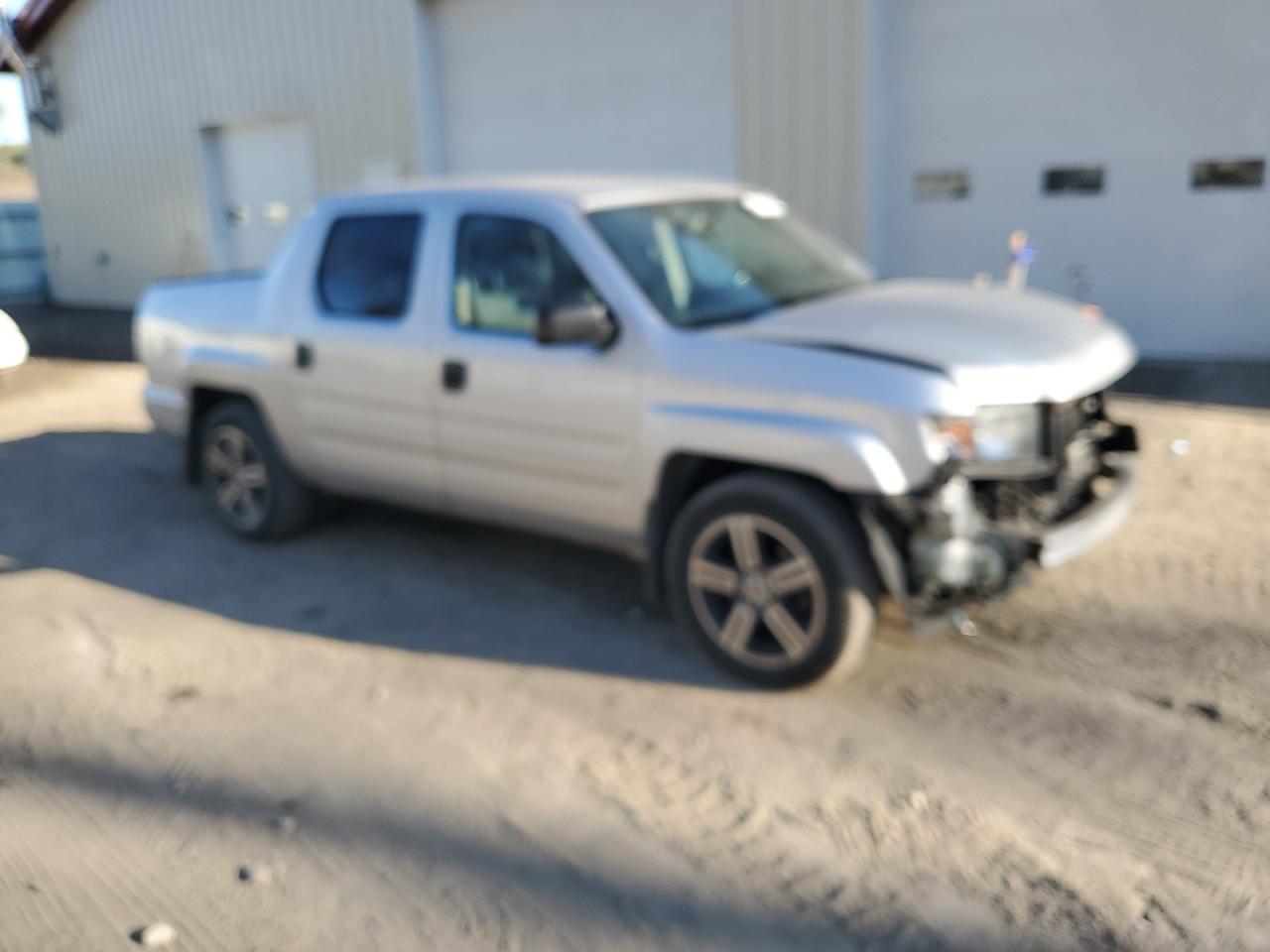 2014 Honda Ridgeline VIN 5FPYK1F78EB010492 Copart auction photo, front end / minor dent/scratches damage thumbnail 4