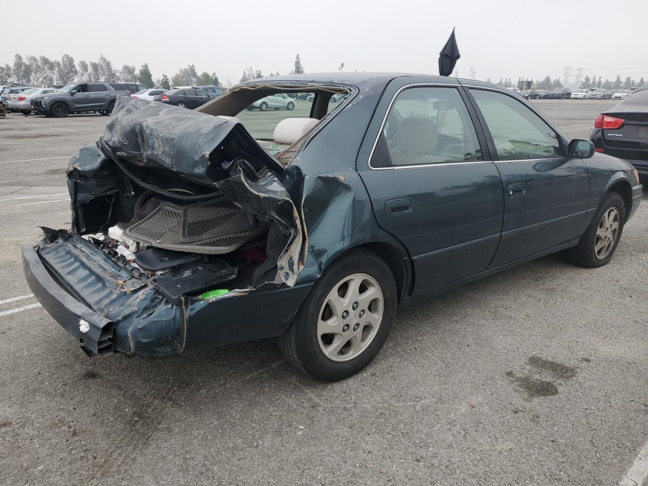 1997 Toyota Camry VIN JT2BG22K4V0098898 Copart auction photo, rear end damage thumbnail 3