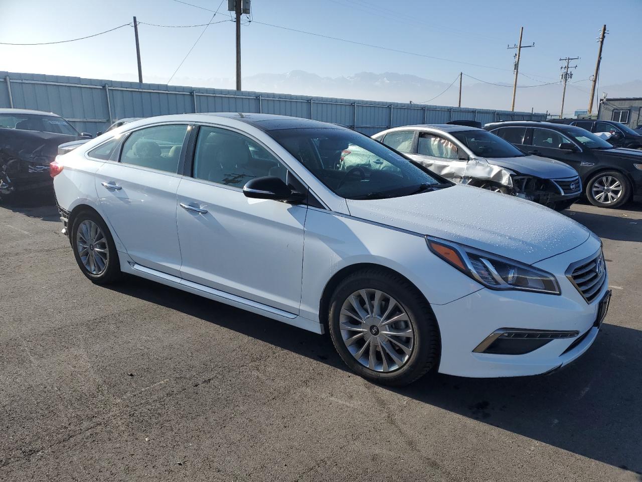 2015 Hyundai Sonata VIN 5NPE34AF8FH012061 Copart auction photo, rear end damage thumbnail 4