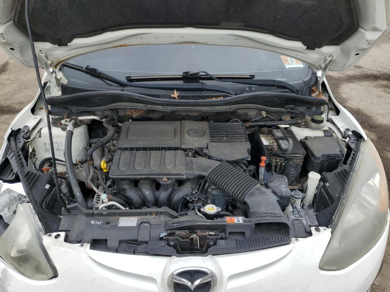 2011 Mazda 2 VIN JM1DE1HY6B0112467 Copart auction photo, all over damage thumbnail 11