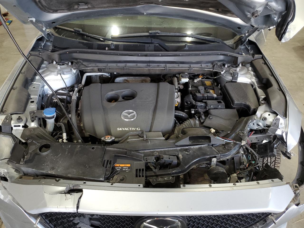2021 Mazda CX-5 VIN JM3KFBCM8M0359093 Copart auction photo, front end / side damage thumbnail 11