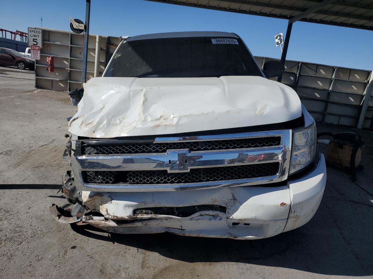 2013 Chevrolet Silverado VIN 1GCNCPEA3DZ329557 Copart auction photo, front end / undercarriage damage thumbnail 5