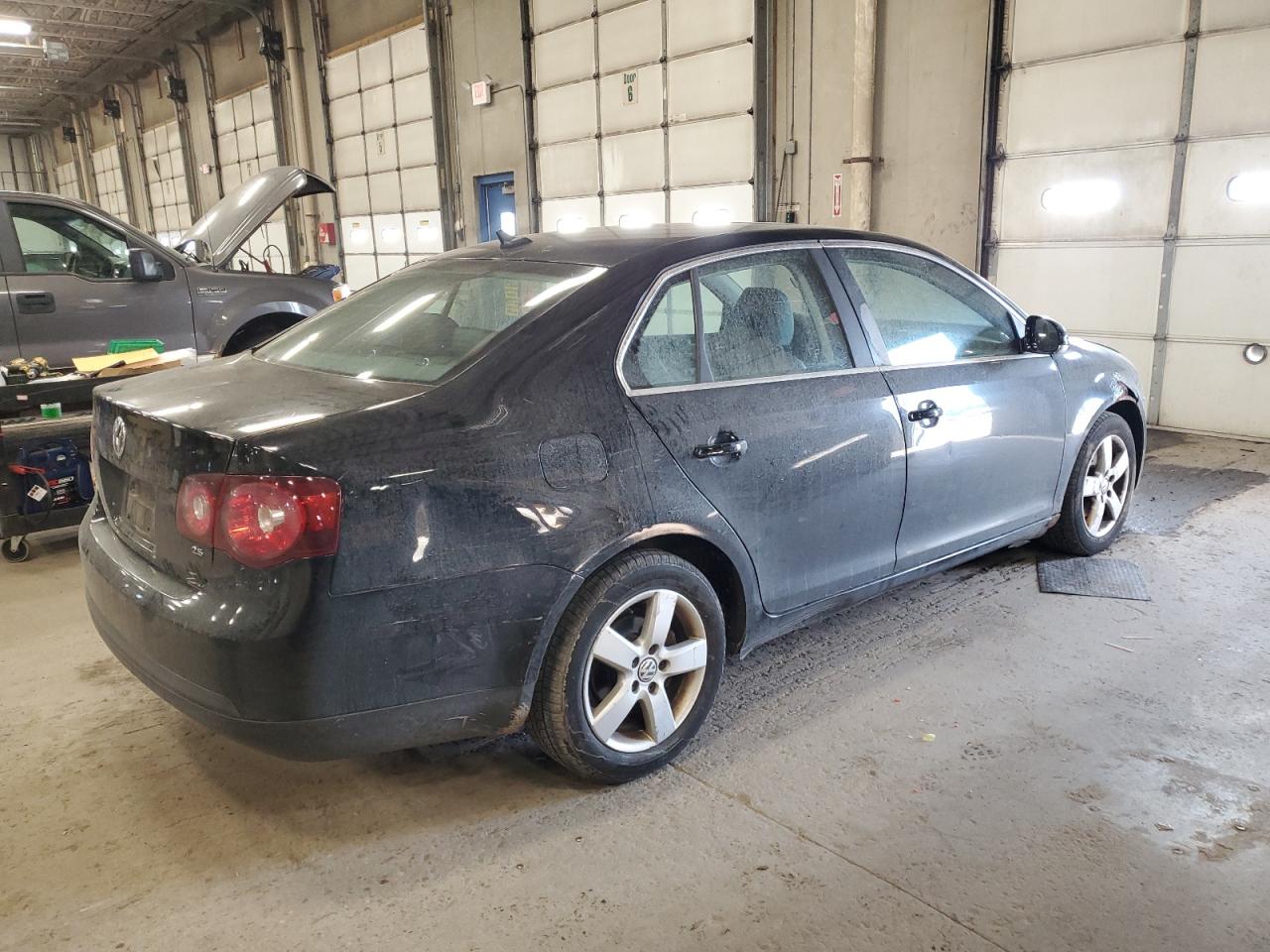 2009 Volkswagen Jetta VIN 3VWRM71K89M005295 Copart auction photo, front end / side damage thumbnail 3