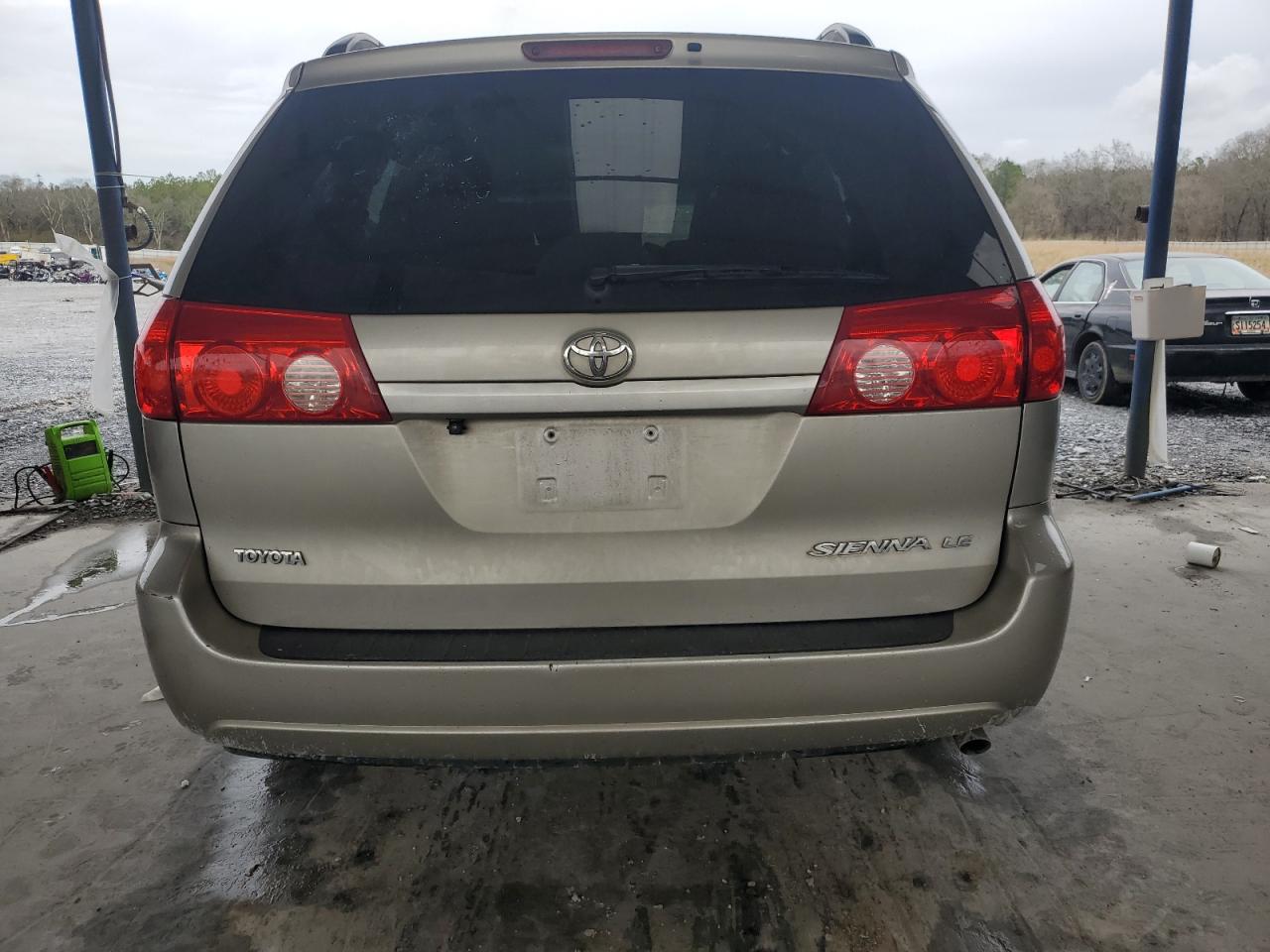 2010 Toyota Sienna VIN 5TDKK4CC6AS298746 Copart auction photo, front end damage thumbnail 6