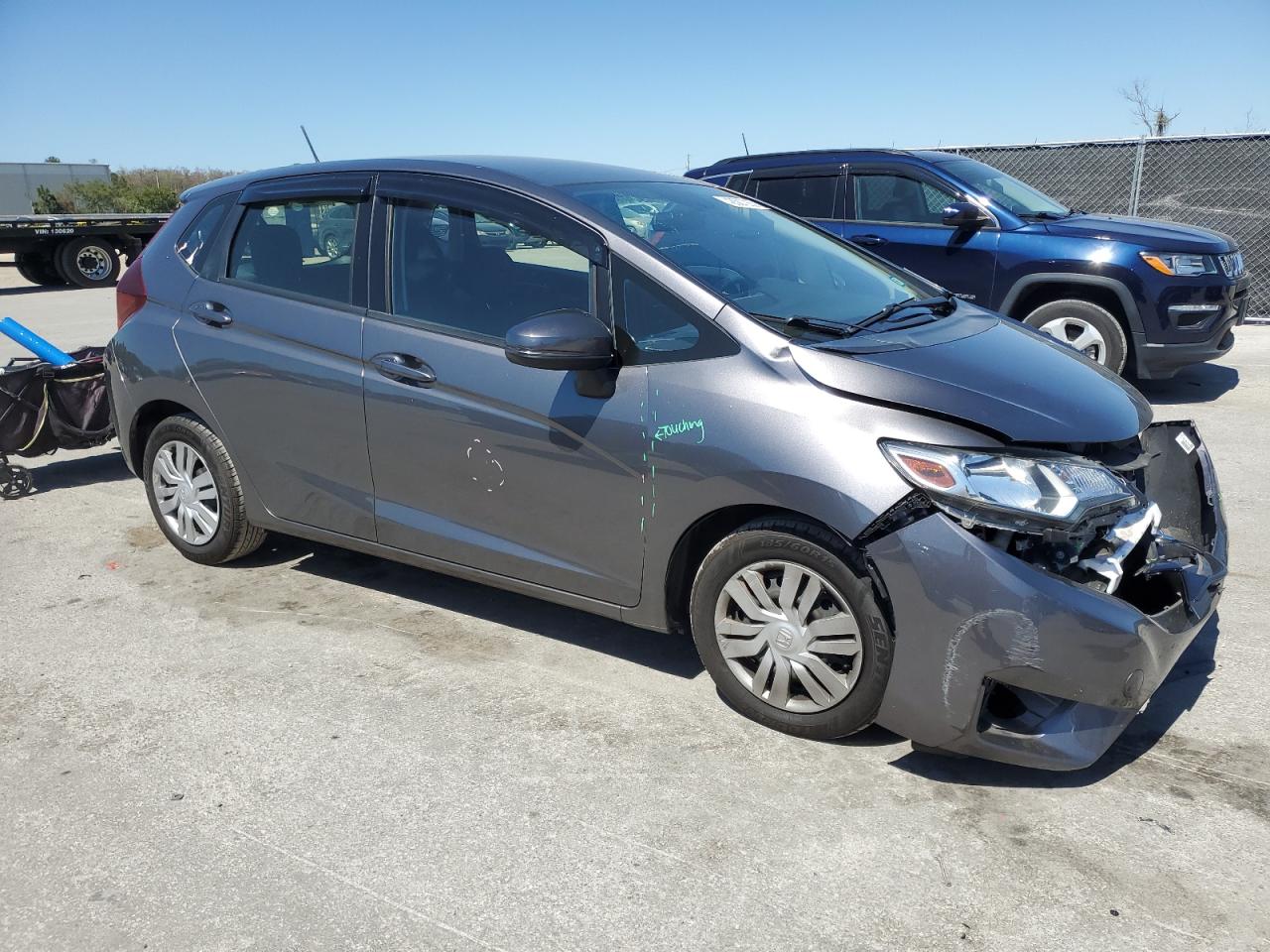 2017 Honda Fit VIN JHMGK5H58HS008223 Copart auction photo, front end / side damage thumbnail 4