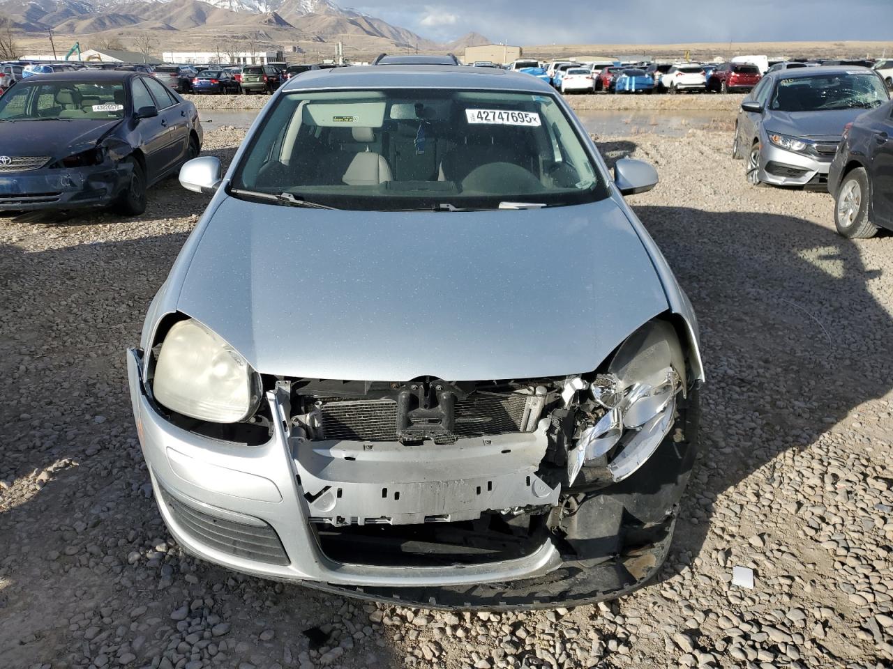 2009 Volkswagen Jetta VIN 3VWRM71K99M061312 Copart auction photo, front end / side damage thumbnail 5